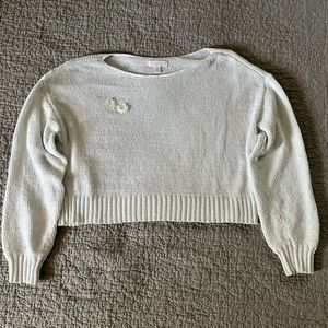 white sweater with flowers